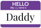 purple sticker that says hello my name is for daddy dom
