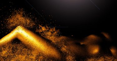 picture of woman with gold explosions who may rub one out