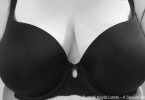 perfect cleavage in a black bra