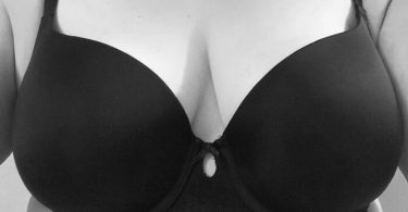 perfect cleavage in a black bra