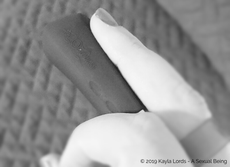 black and white view of DiGiT finger vibrator on Kayla Lords finger